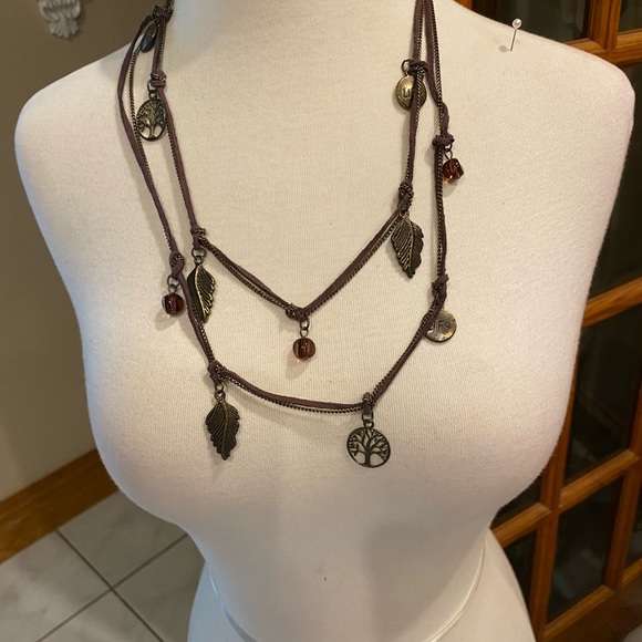 Tree of life necklace has a chain and a tin cord to hold the charms - Picture 4 of 5